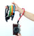 Colorful camera wrist straps (black, green, orange, blue, red) being held with a camera in hand for secure carrying.
