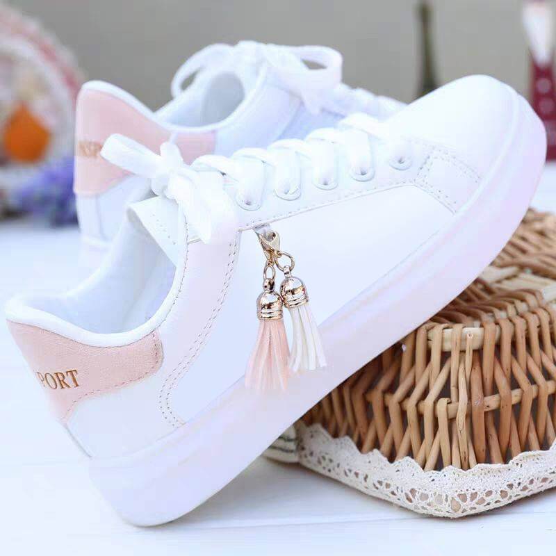 Stylish white mesh shoes for women with pink accents and decorative tassels, perfect for casual wear and sports.